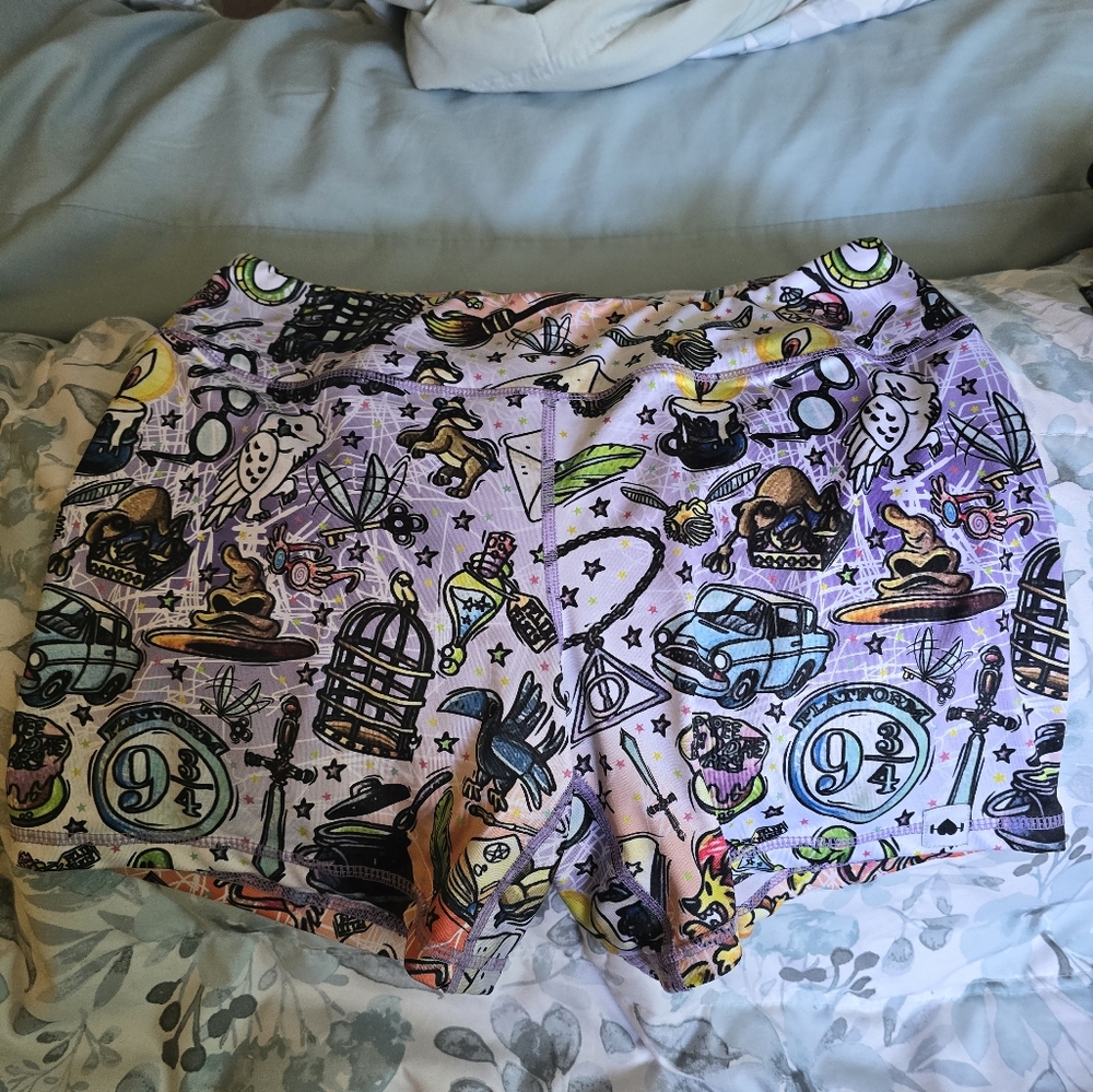Women's Lavender Printed Athletic Shorts with Multicolor Icons - Harry Potter